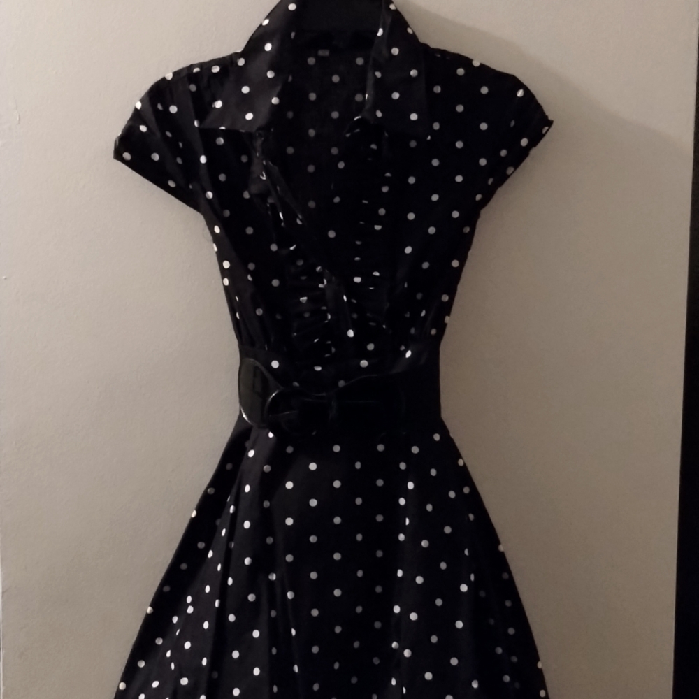 Women's black and white polka dot dress.